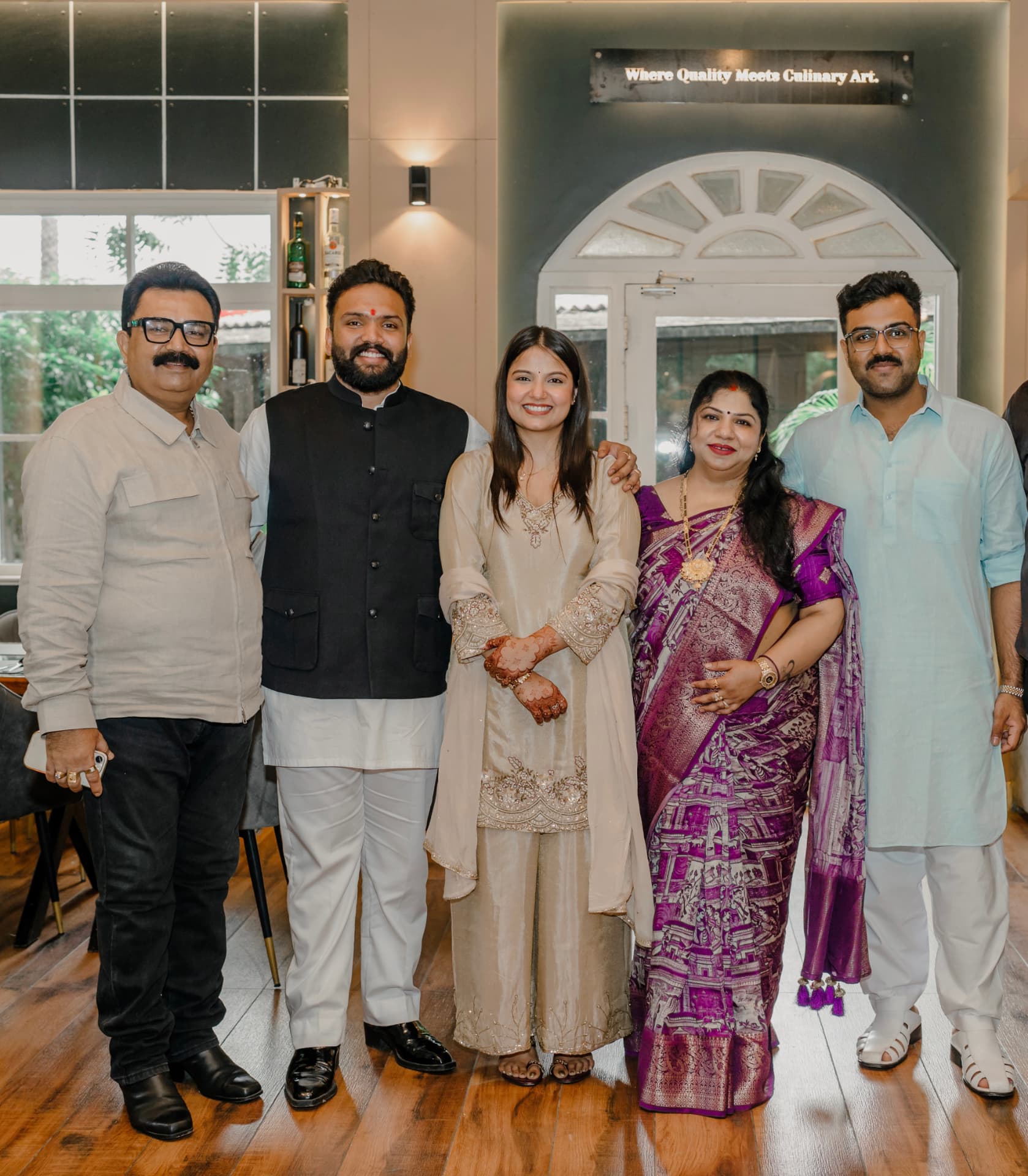 The couple with their parents